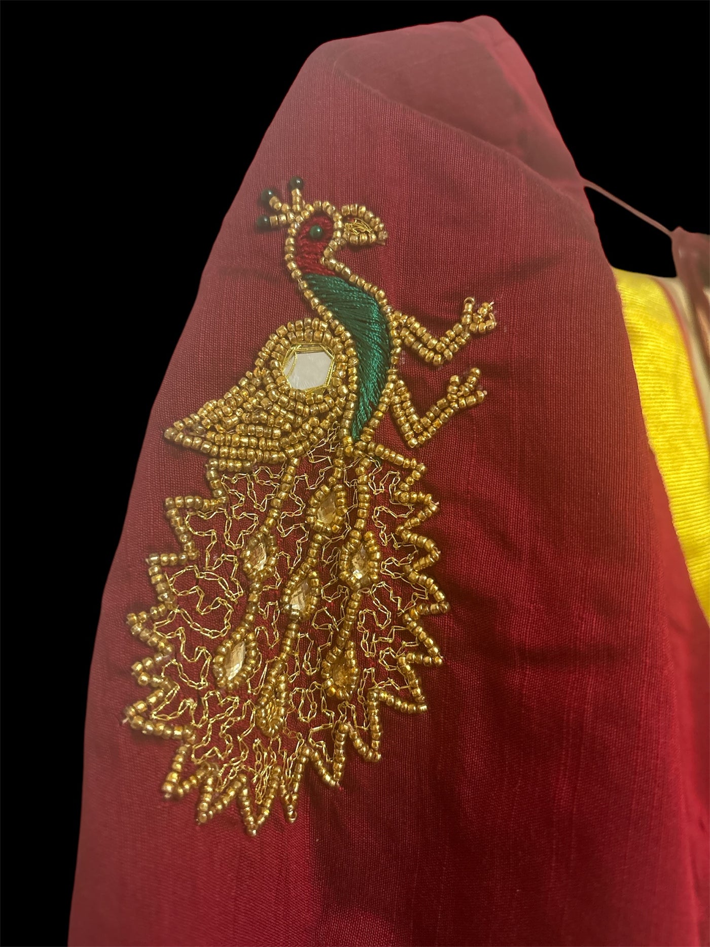 Gold with maroon border tissue aari work set mundu with blouse