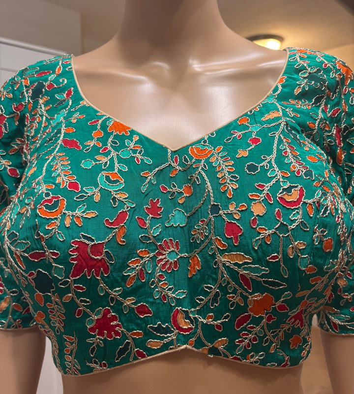 Green silk embroidered padded blouse