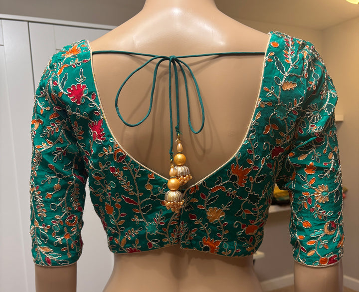 Green silk embroidered padded blouse