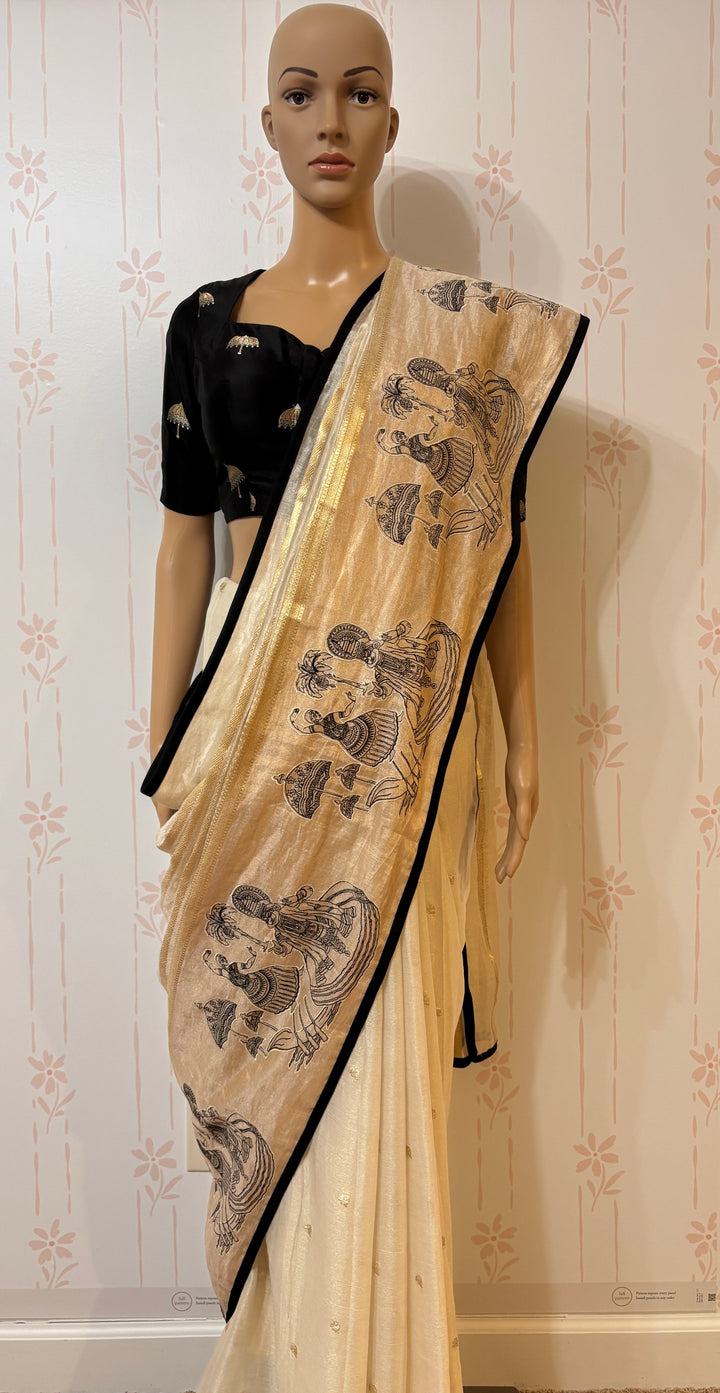 Cream and gold zari tissue saree