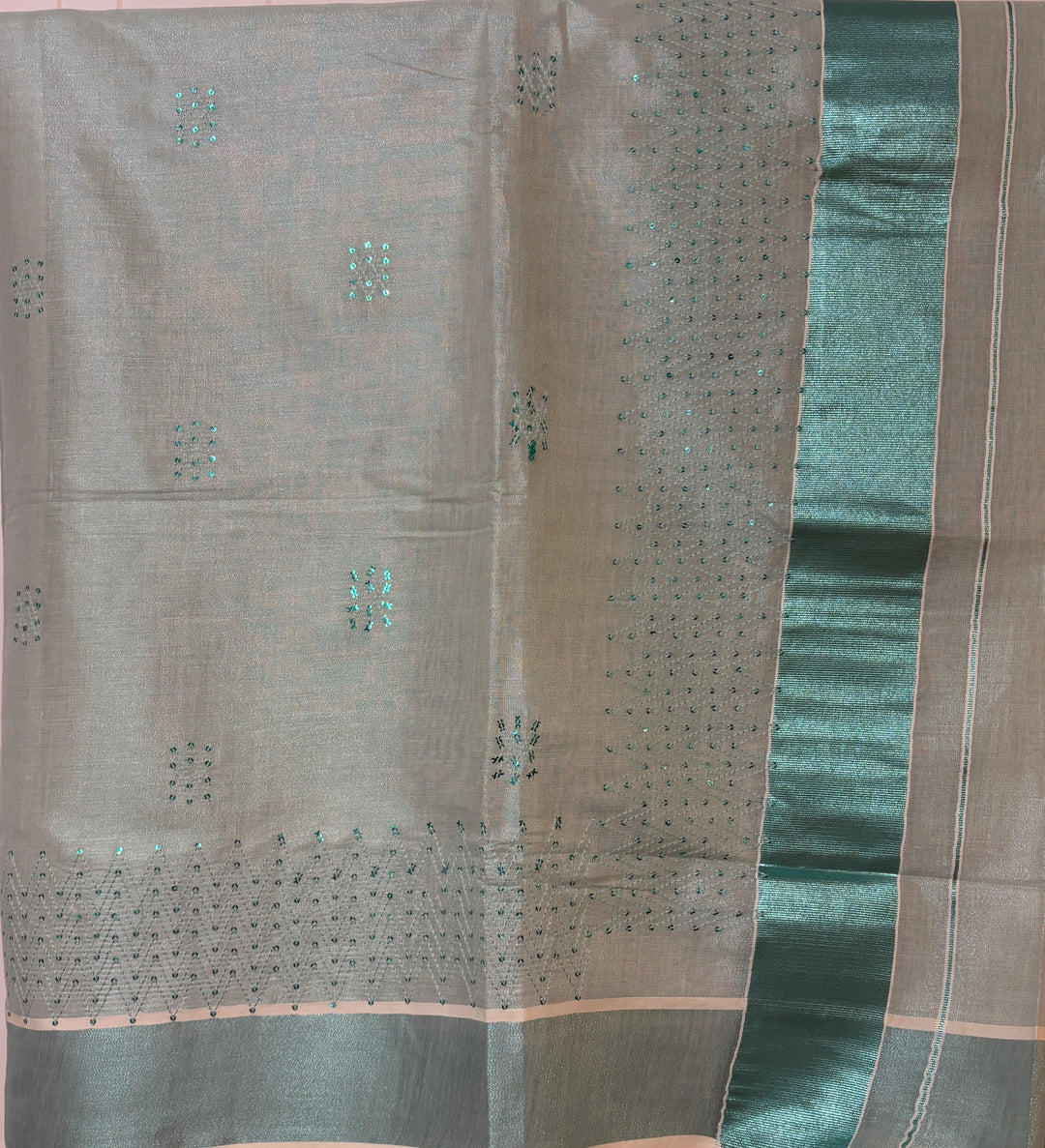 Kerala turquoise tissue saree with sequence work