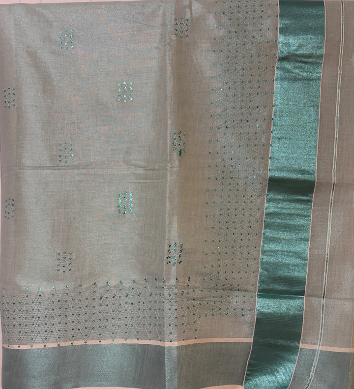 Kerala turquoise tissue saree with sequence work