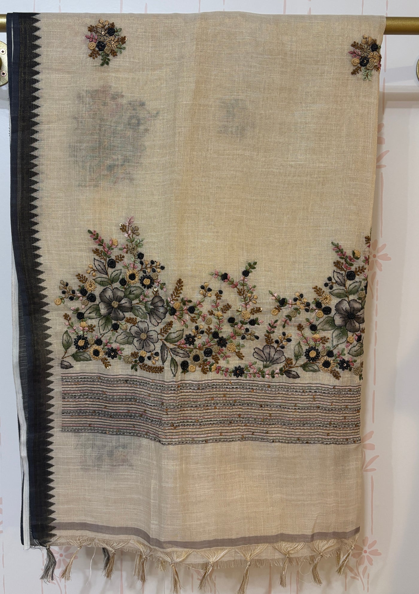 Linen tissue saree with French knot embroidery work