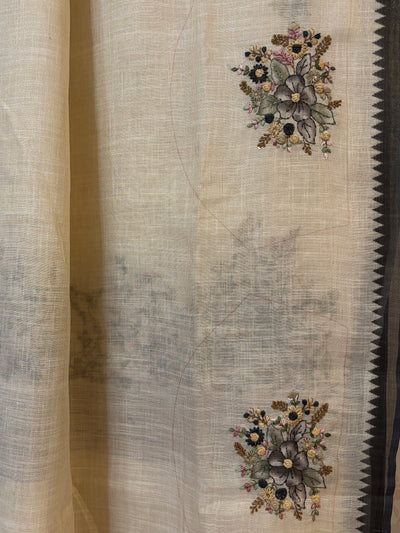 Linen tissue saree with French knot embroidery work