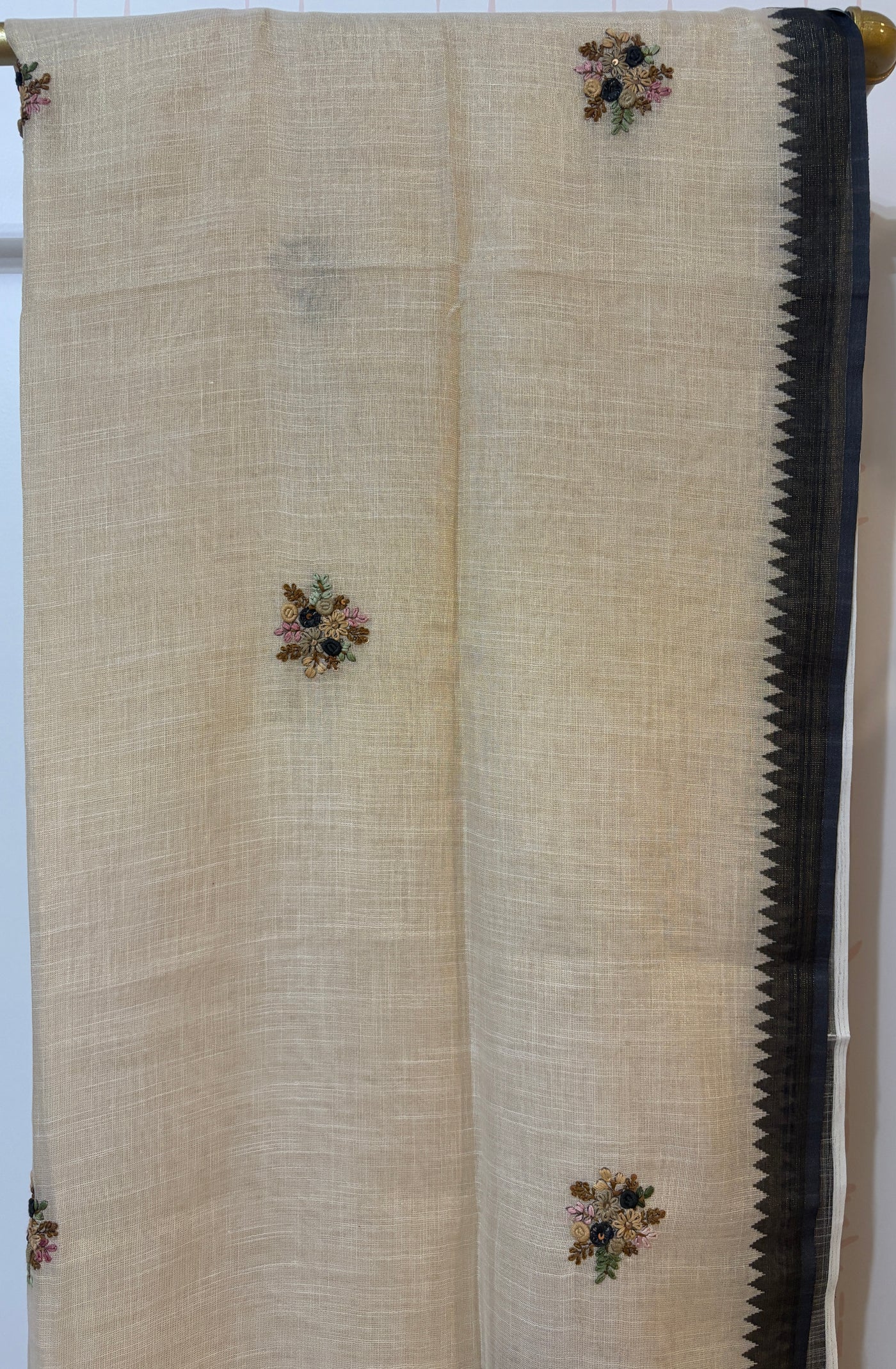 Linen tissue saree with French knot embroidery work