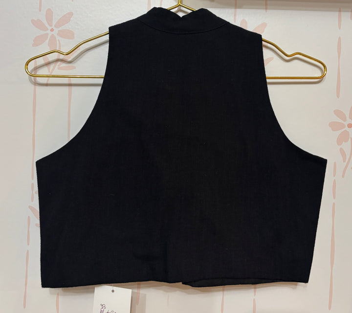 Black cotton sleeveless blouse with high neck