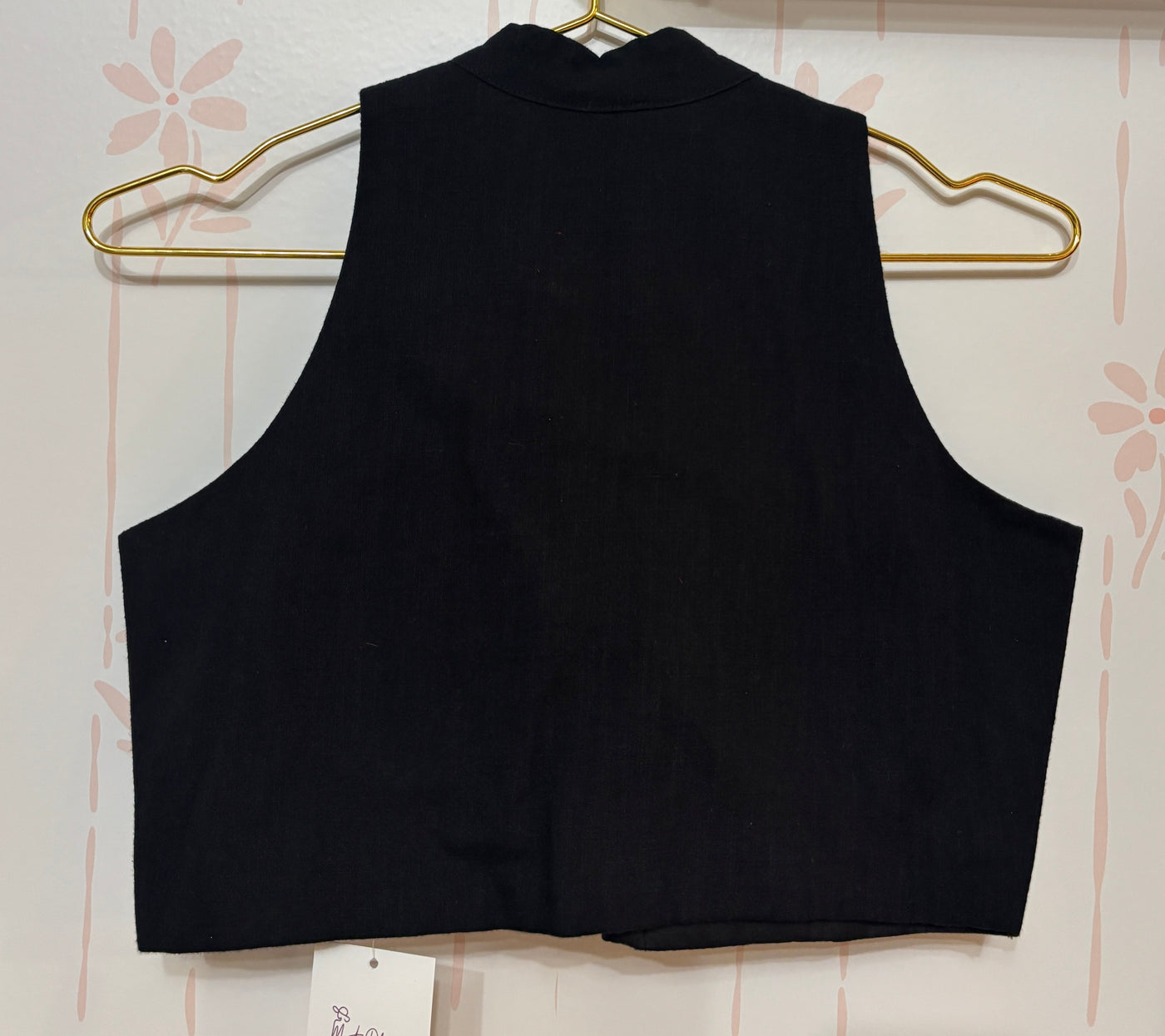 Black cotton sleeveless blouse with high neck