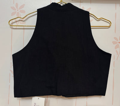 Black cotton sleeveless blouse with high neck