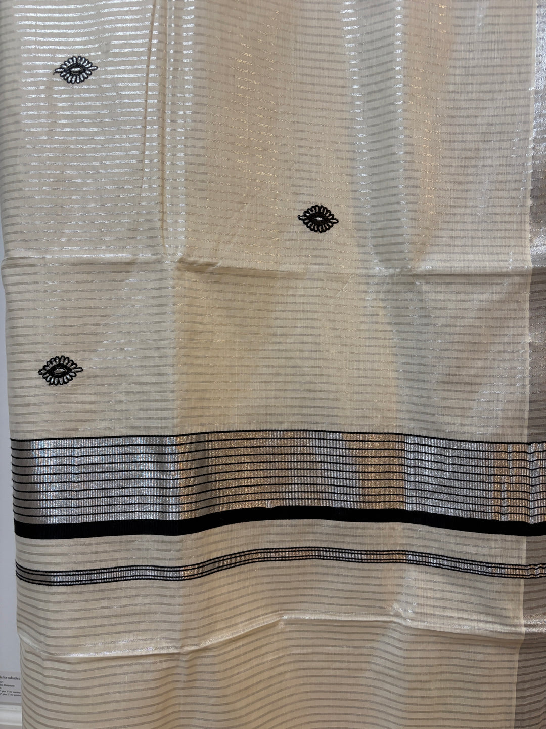 Kerala Silver Kasavu and black temple border saree