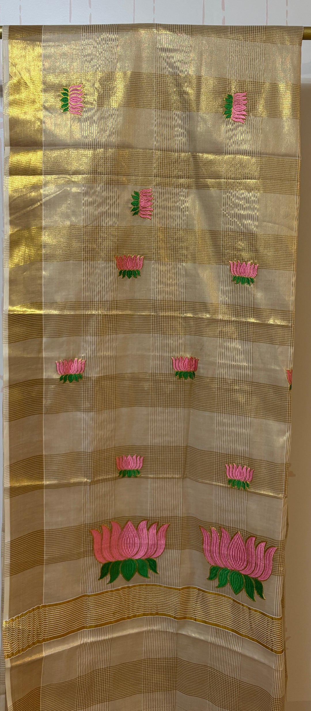 Kerala tissue saree with lotus embroidery and checks