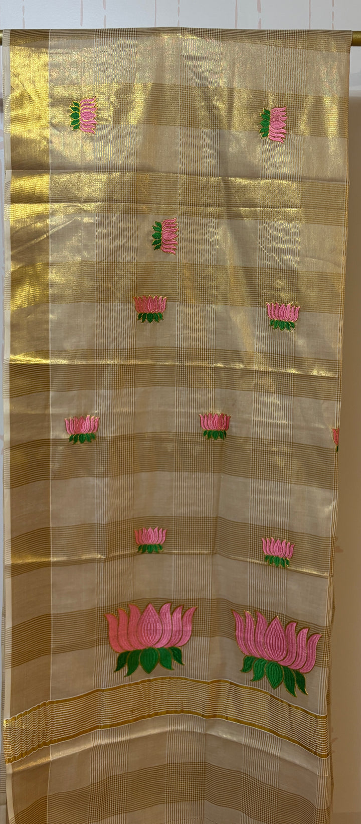 Kerala tissue saree with lotus embroidery and checks