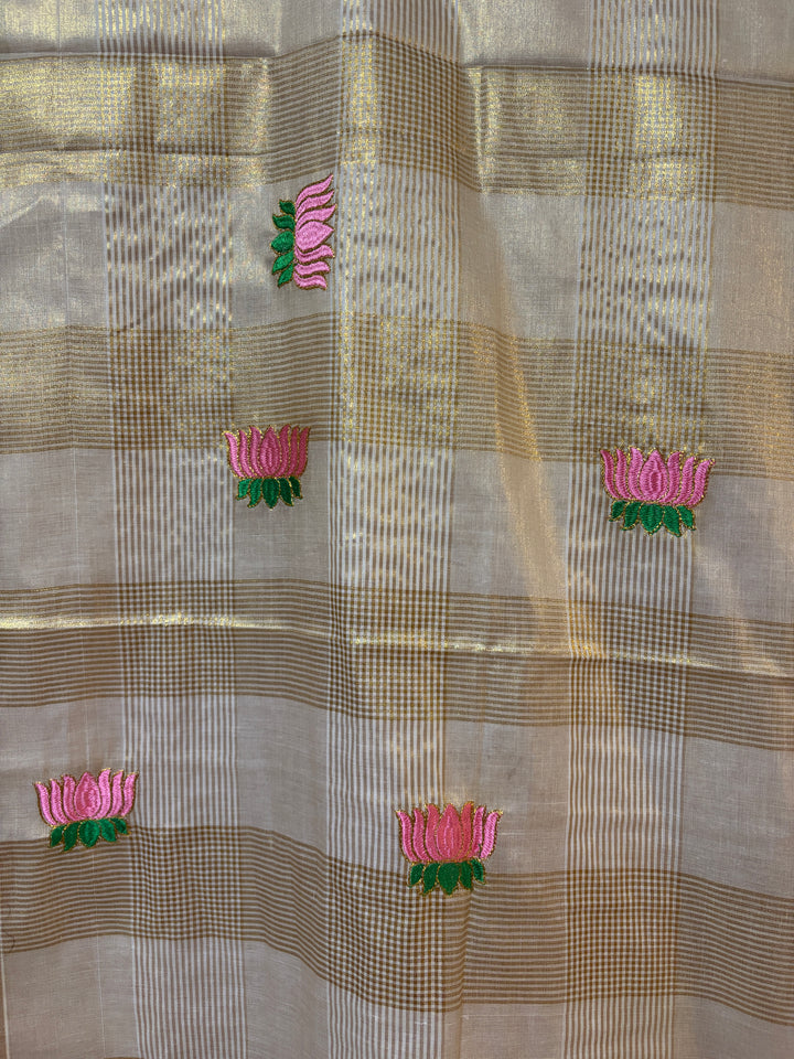 Kerala tissue saree with lotus embroidery and checks
