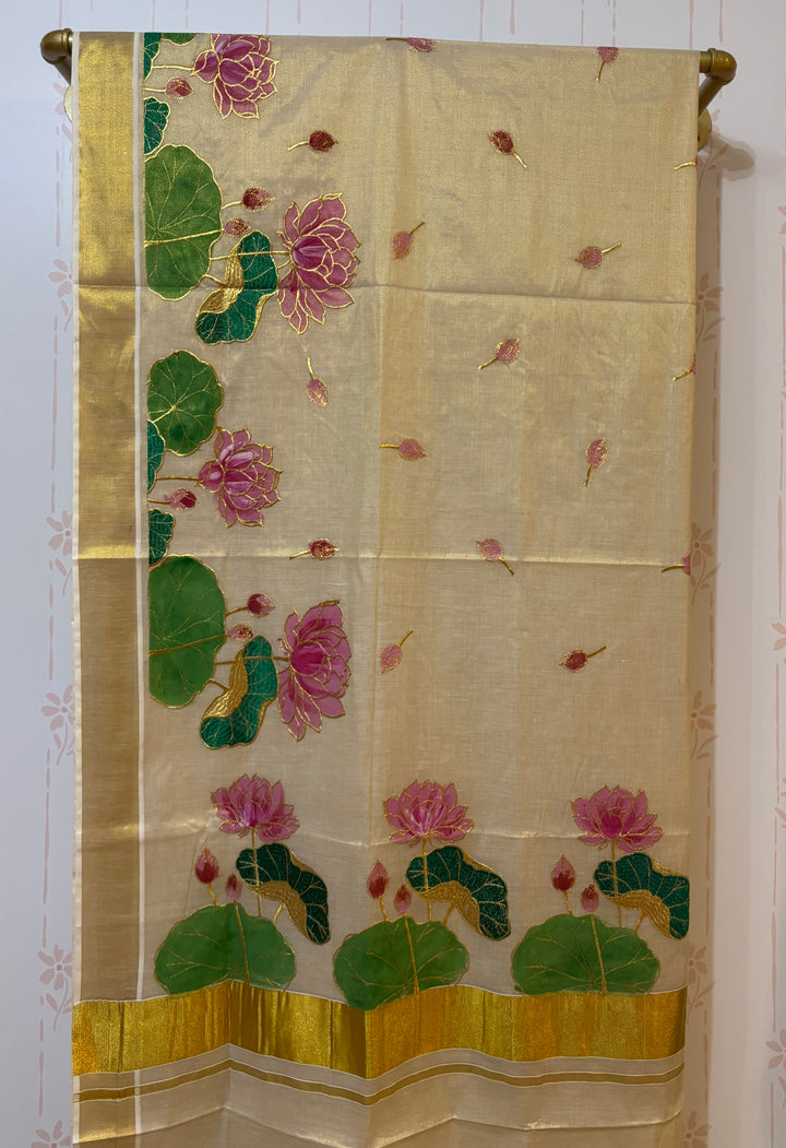 Kerala tissue saree with painted lotus and embroidery