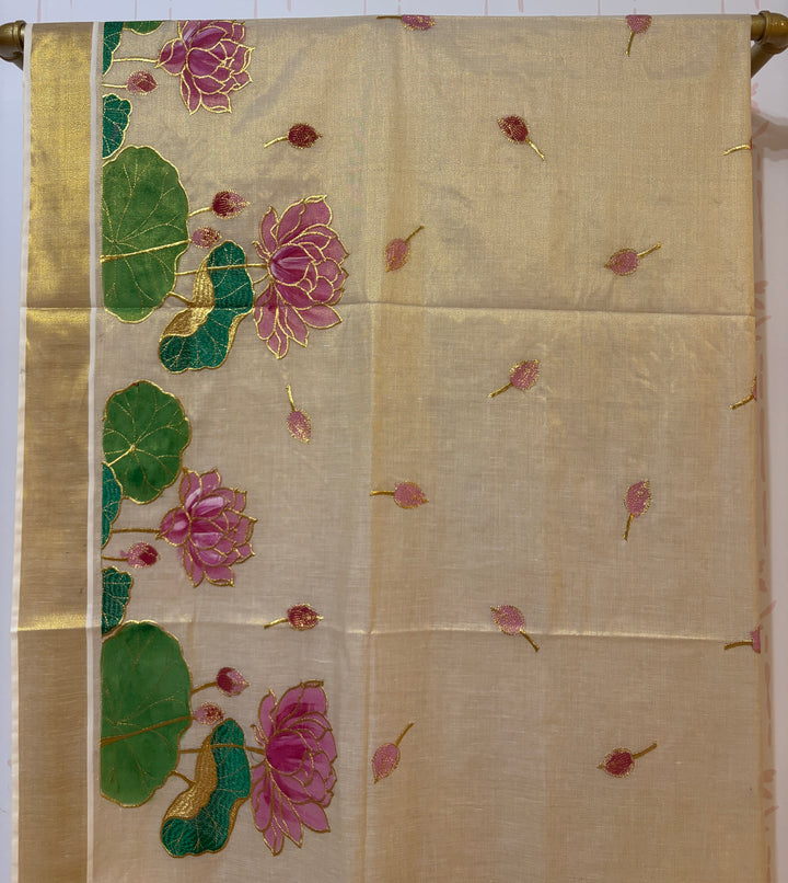 Kerala tissue saree with painted lotus and embroidery