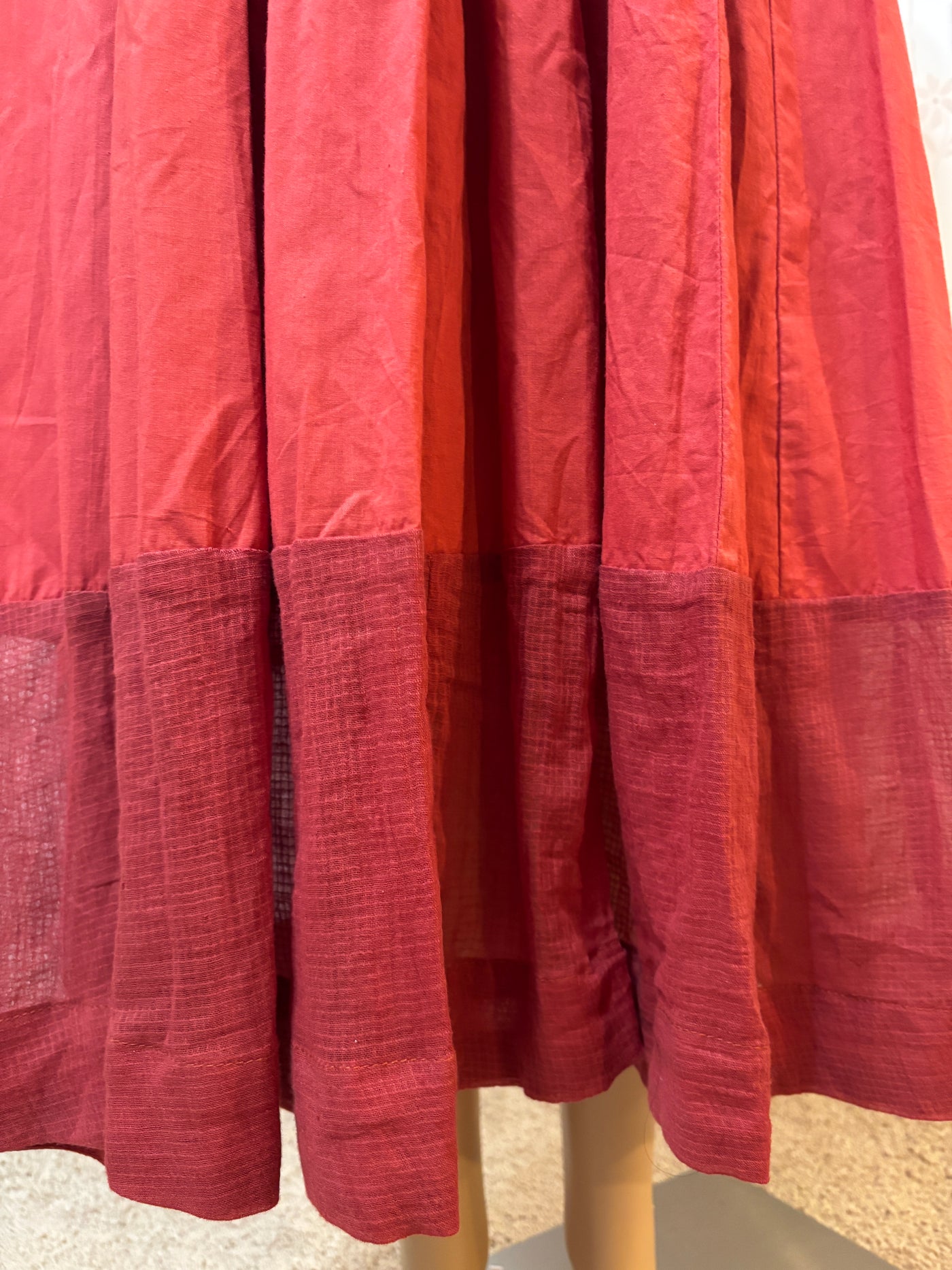 Gerua Maroon Cotton Halter neck flared dress with Kota border