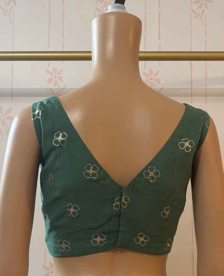 emerald green Pita work georgette saree and blouse set