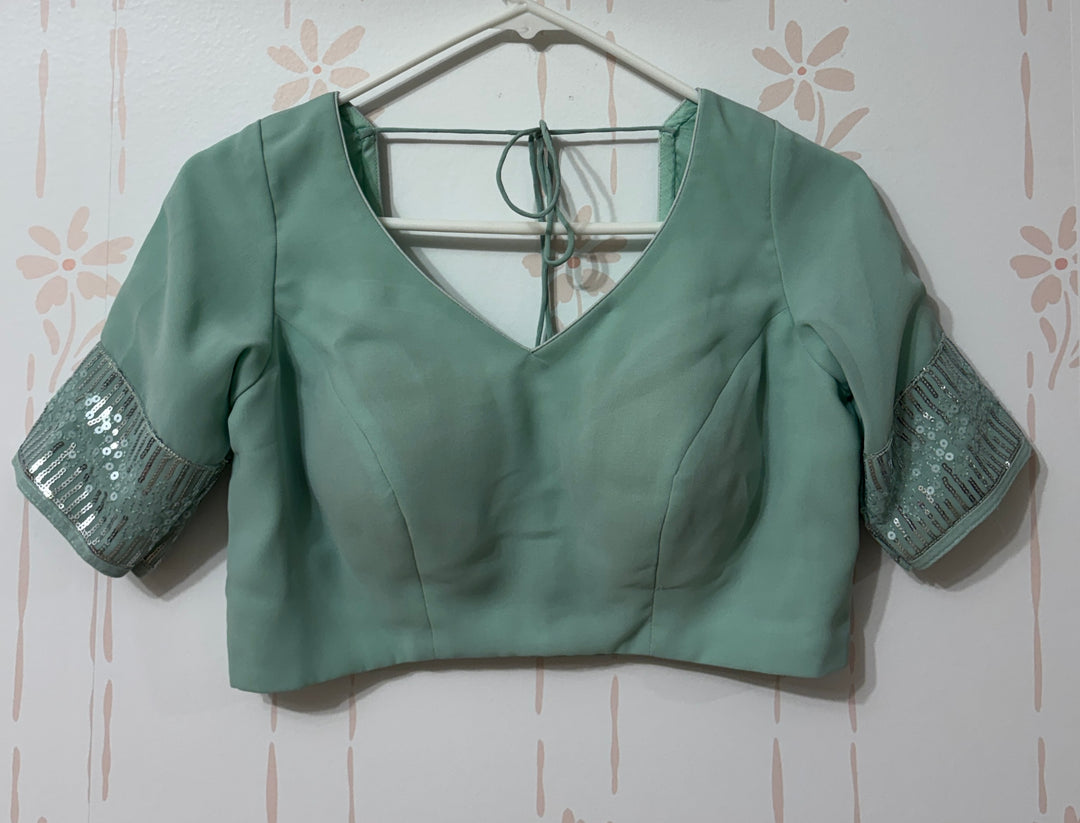 Light blue sequins saree and blouse set