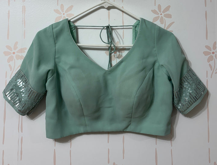 Light blue sequins saree and blouse set