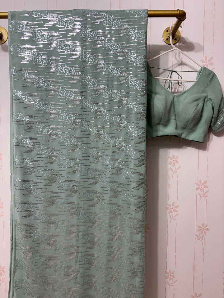 Light blue sequins saree and blouse set
