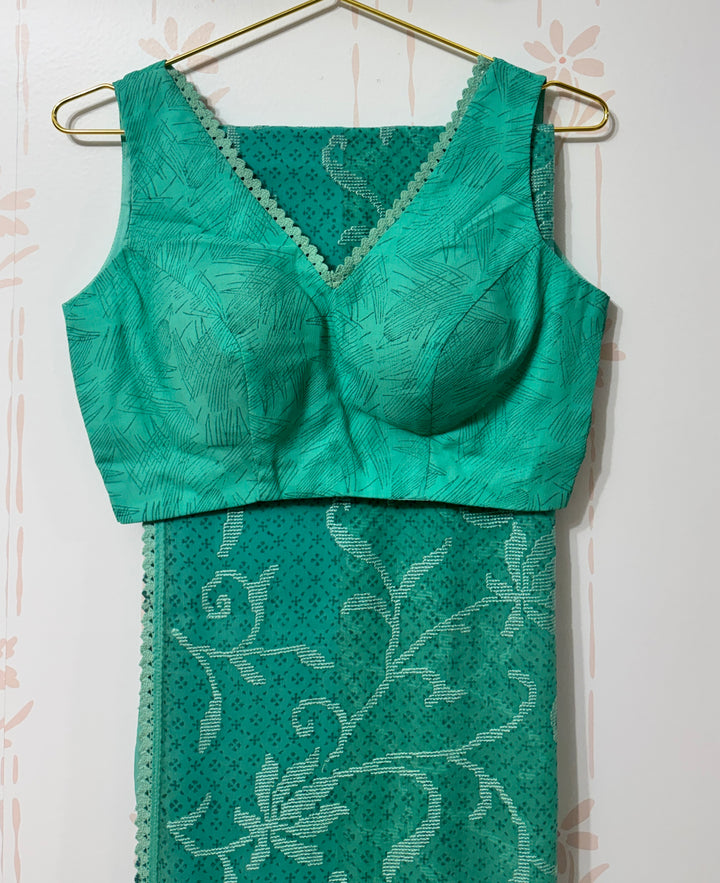 Sea green georgette saree and blouse set