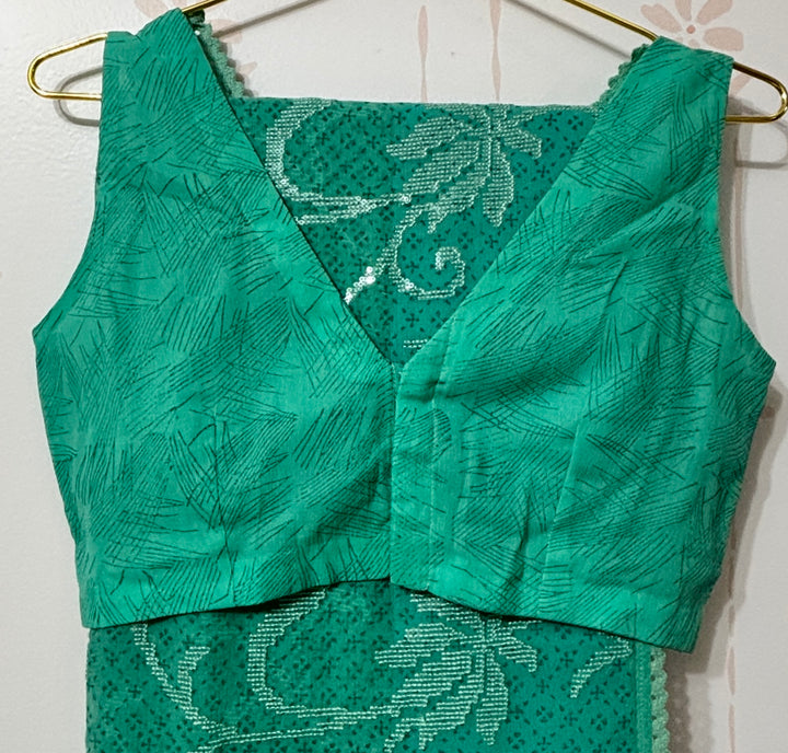 Sea green georgette saree and blouse set