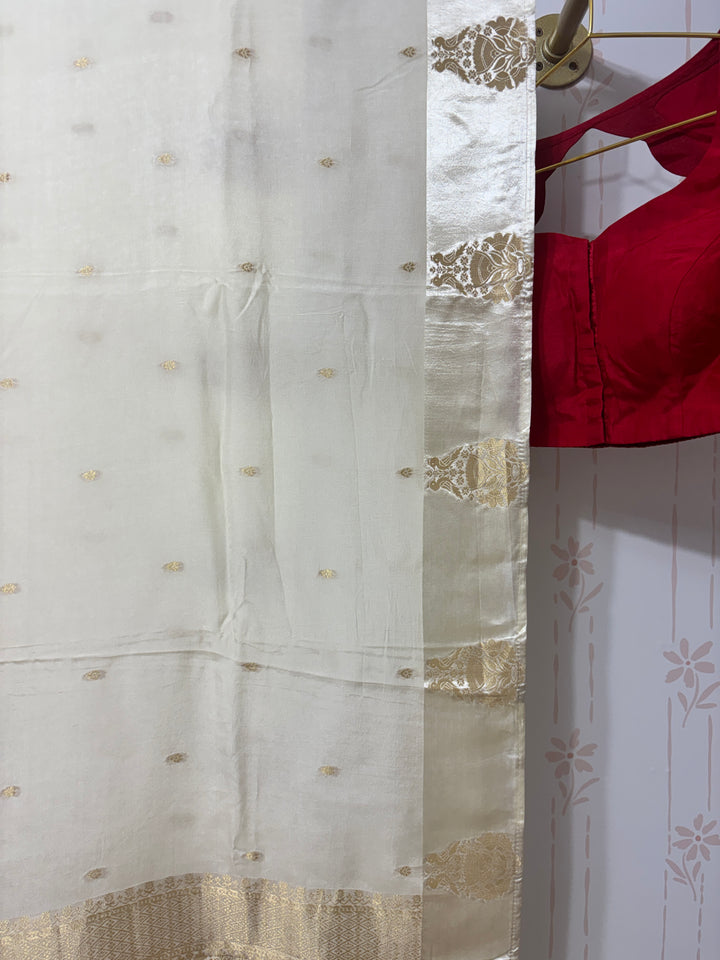 Off white Muga silk saree and blouse set
