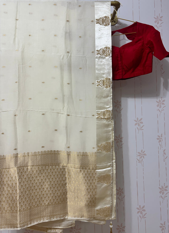 Off white Muga silk saree and blouse set