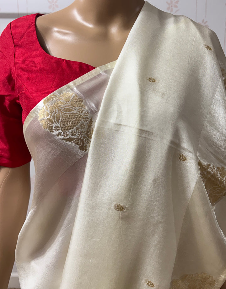 Off white Muga silk saree and blouse set