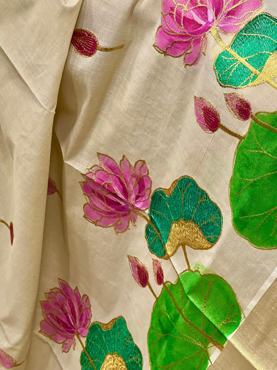 Kerala tissue saree with painted lotus and embroidery