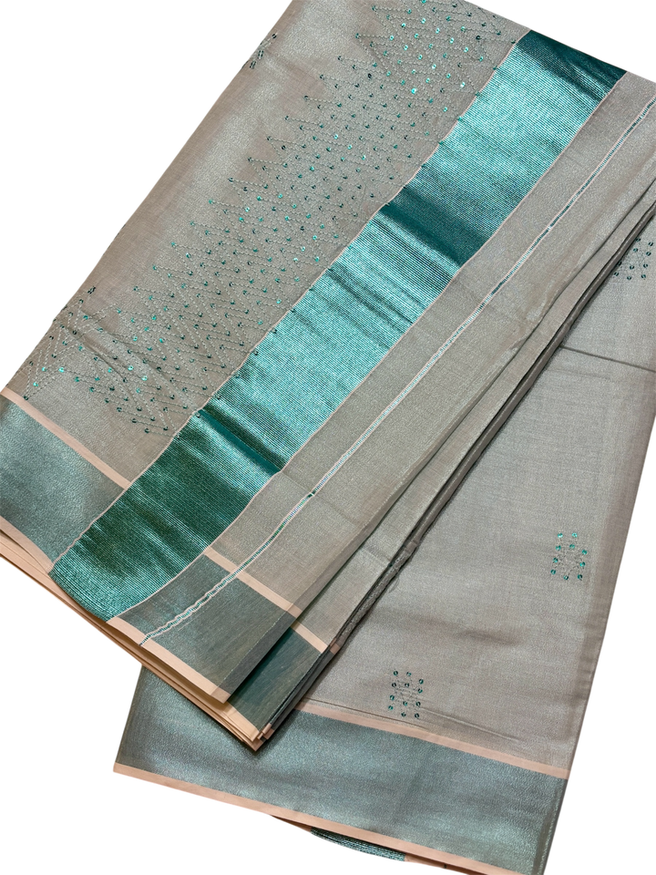 Kerala turquoise tissue saree with sequence work