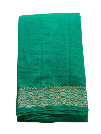 Emerald green tussar silk saree with gold and dull gold zari