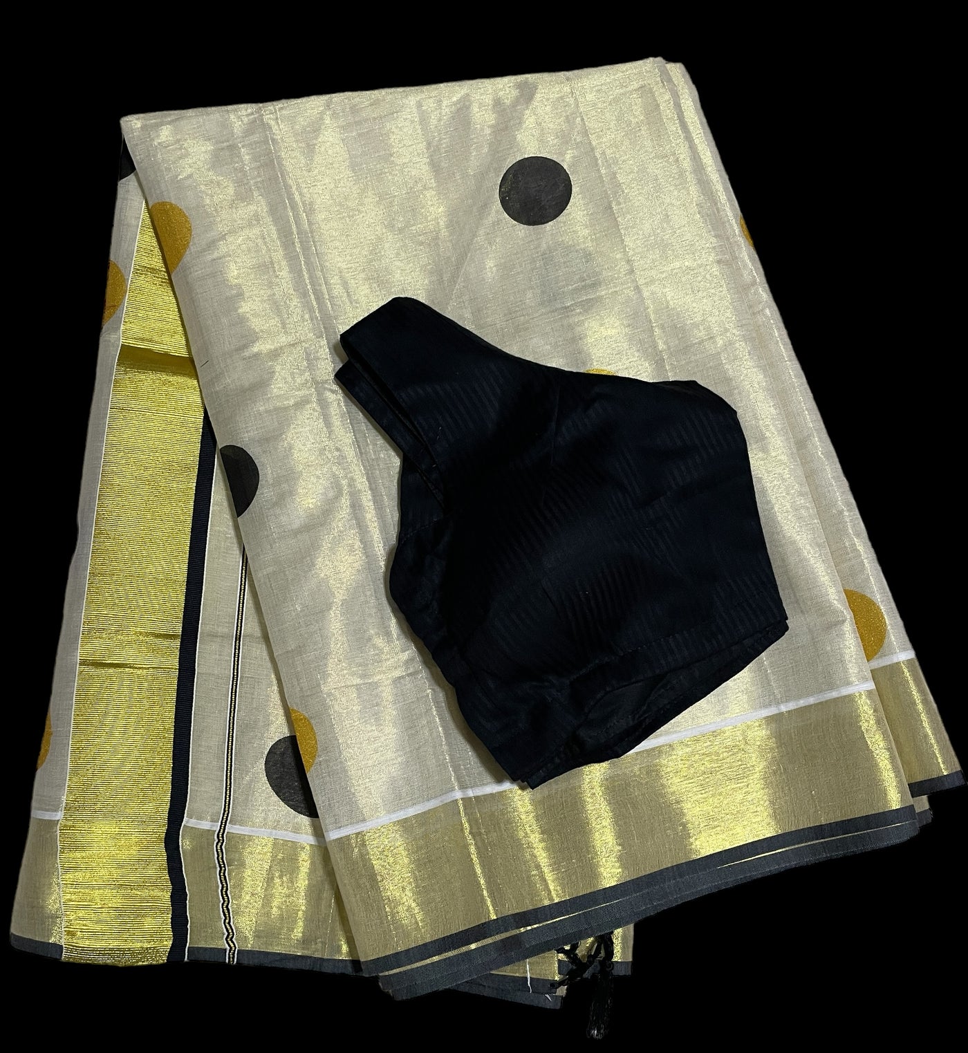 Kerala tissue saree with black polka dots