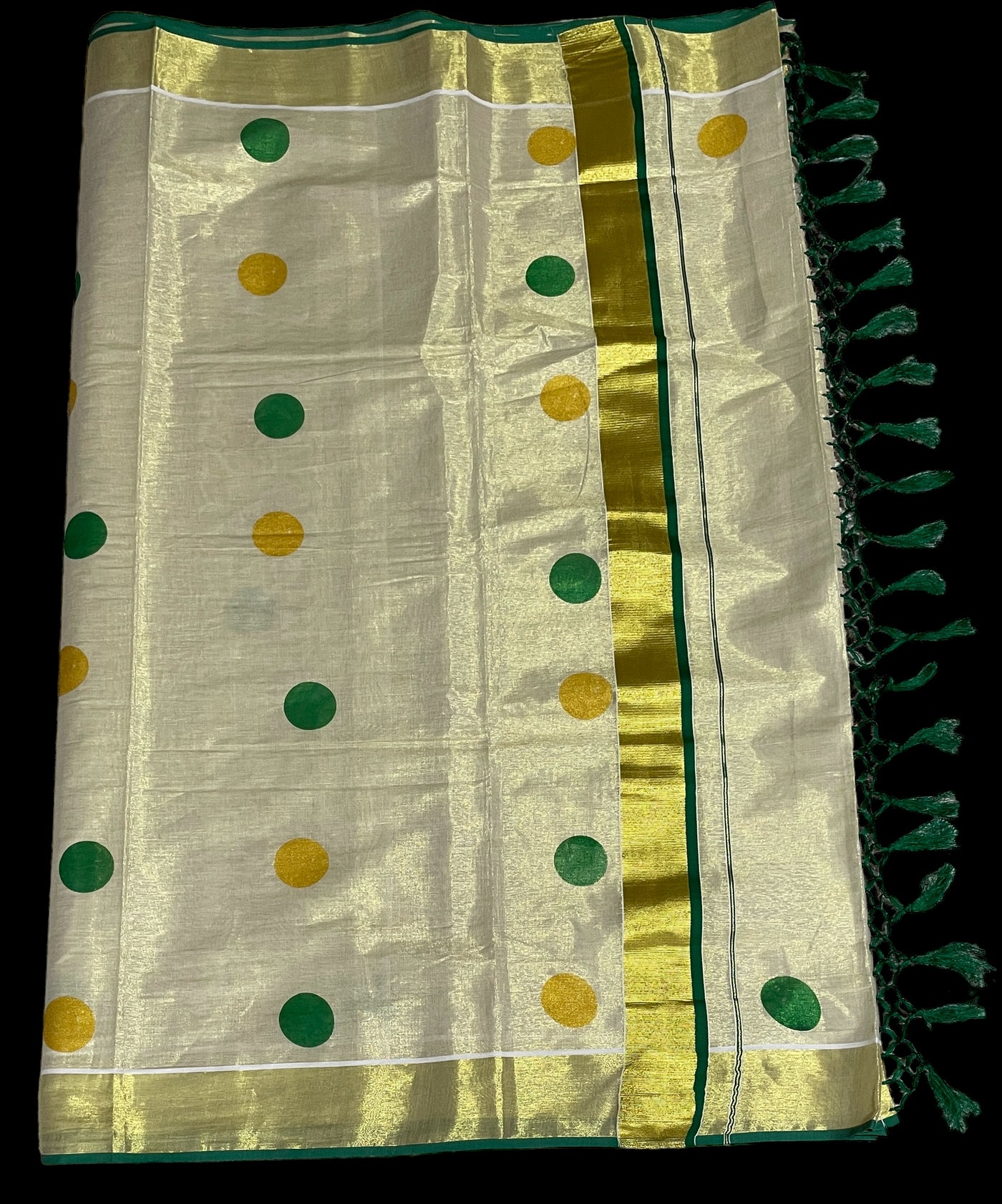 Kerala tissue saree with dark green polka dots