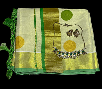 Kerala tissue saree with light green polka dots