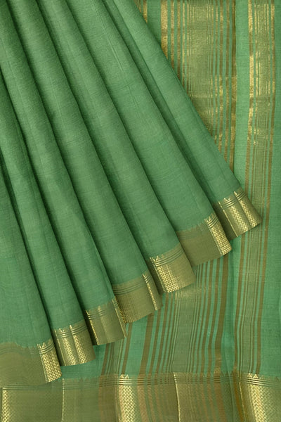 Pista green tussar silk saree with gold border