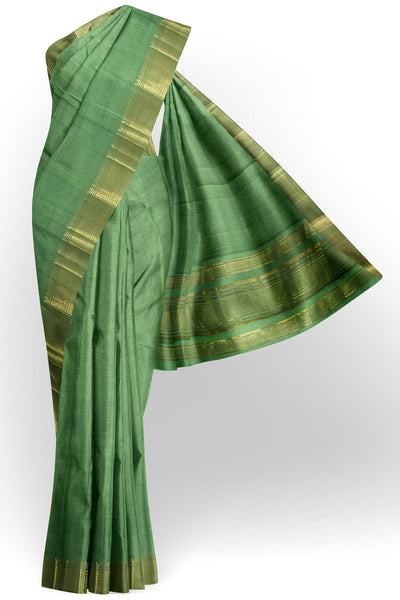 Pista green tussar silk saree with gold border