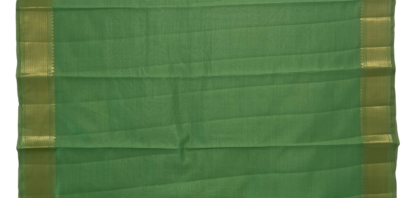 Pista green tussar silk saree with gold border