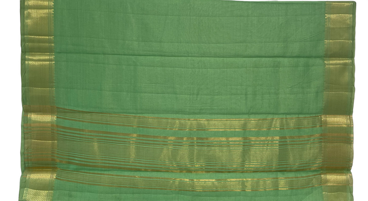Pista green tussar silk saree with gold border