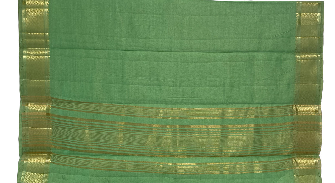 Pista green tussar silk saree with gold border